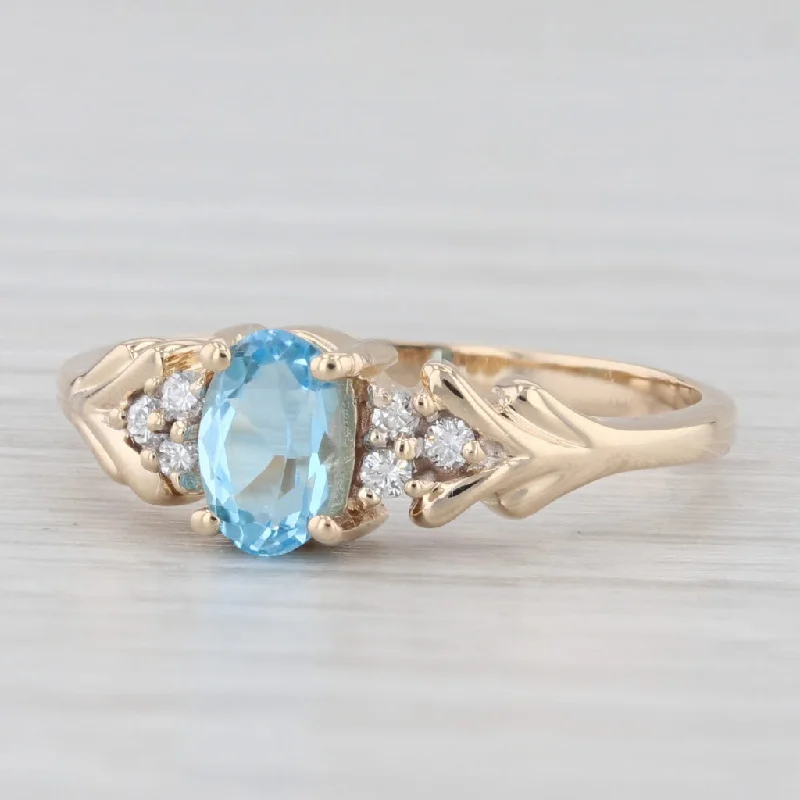 women’s solitaire engagement ring with diamond-0.60ctw Oval Blue Topaz Diamond Ring 14k Yellow Gold Size 6.25