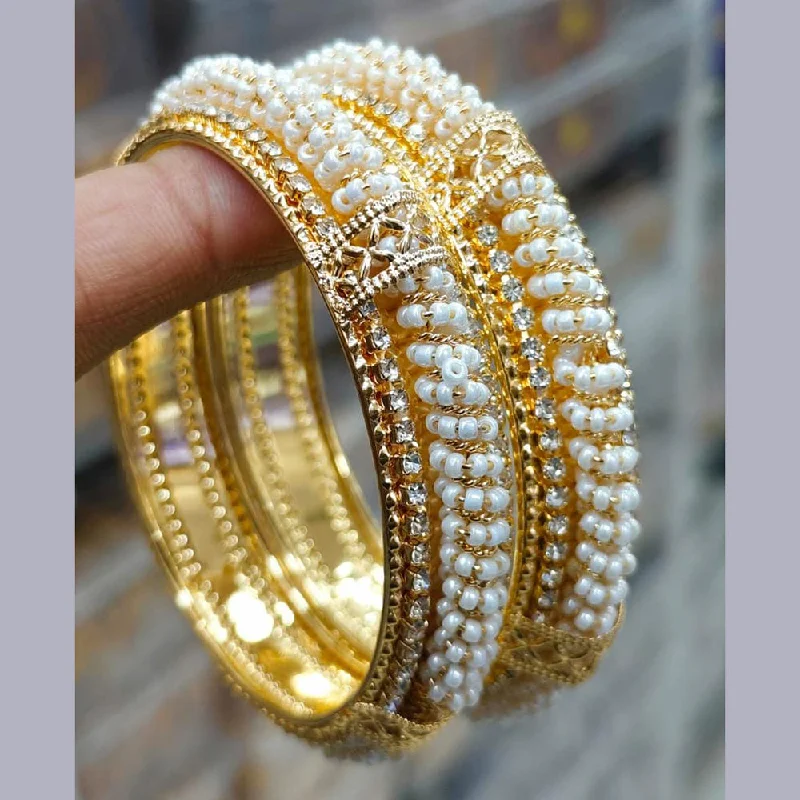 women’s pearl bracelet-Pooja Bangles Gold Plated Austrian And Pearl Bangles Set